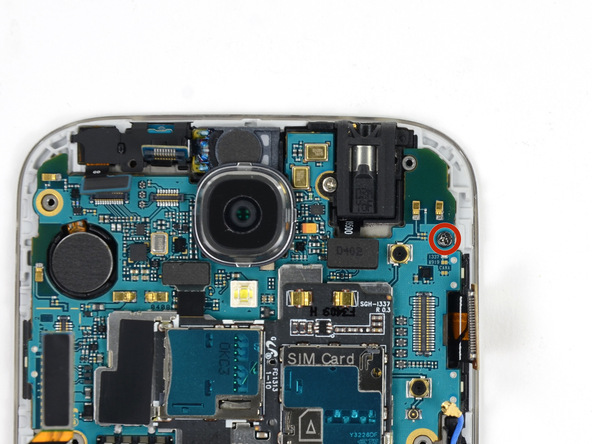 پیچ 2.4 میلیمتری گوشه مادربرد Galaxy S4 تعمیری را با پیچ گوشتی #00 باز کنید.